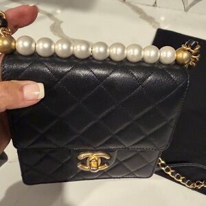 Chic Black Quilted Handbag with Pearl Handle